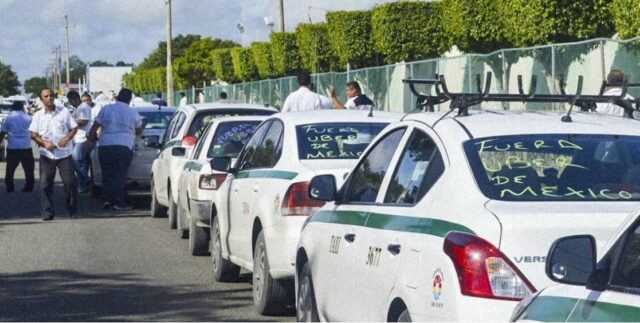 cancun:-pelea-entre-taxistas-y-uber-se-define-en-la-justicia-esta-semana