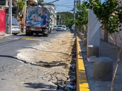 baches,-desniveles-y-tapones-agravan-el-transito-en-santo-domingo